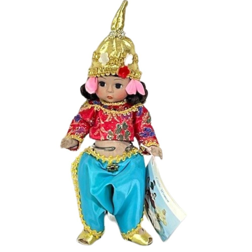 Madame Alexander restrung 8" Thailand doll with stand.